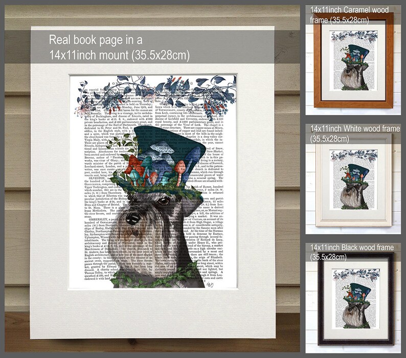 May include: A black and white illustration of a miniature schnauzer wearing a blue top hat with mushrooms and greenery. The image is printed on a book page and framed in a white wood frame. The frame is 14 inches by 11 inches and measures 35.5 cm by 28 cm.