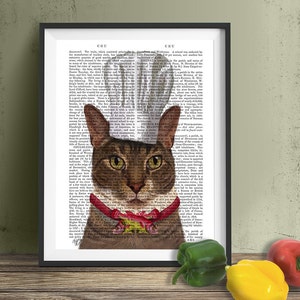 May include: A brown tabby cat wearing a white chef's hat and a red and gold bow tie. The cat is looking directly at the viewer. The image is superimposed on a page of text from an old book.
