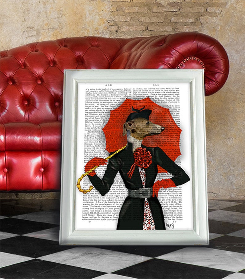 May include: A whimsical illustration of a dog dressed in a black coat and hat, holding a red umbrella. The dog is standing in front of a page of text from a vintage book. The illustration is in a white frame.