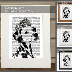 May include: A black and white dalmatian dog wearing a green jeweled crown, printed on a book page. The image is framed in a white, black, and brown wood frame. The frame is 14 inches by 11 inches and measures 35.5 centimeters by 28 centimeters.