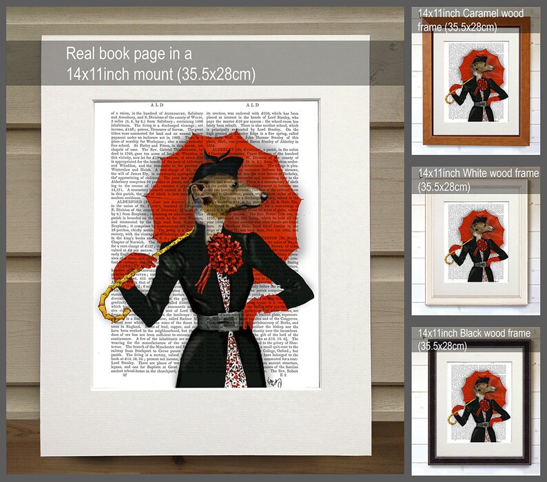 May include: A whimsical illustration of a dog wearing a black dress and a red hat, holding a red umbrella. The illustration is printed on a book page and framed in a black wood frame. The frame is 14 inches by 11 inches (35.5 cm by 28 cm).