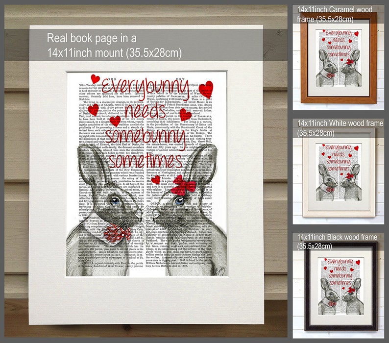 May include: A 14x11 inch print of a book page with a drawing of two bunnies with red bows. The text on the page reads "Everybunny needs somebunny sometimes". The print is shown in three different frames: caramel wood, white wood, and black wood.