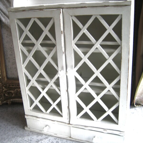 Distressed white tea cabinet