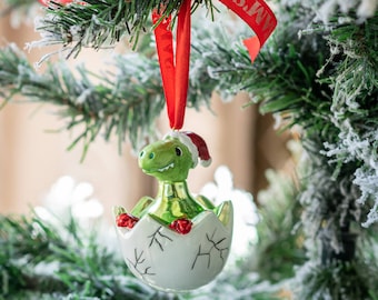 Enfeite de Natal personalizado de dinossauro chocando: enfeite de cerâmica com acabamento manual