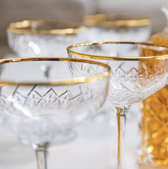 Wow your holiday guests with fancy caramel and sugar-rimmed champagne  glasses.