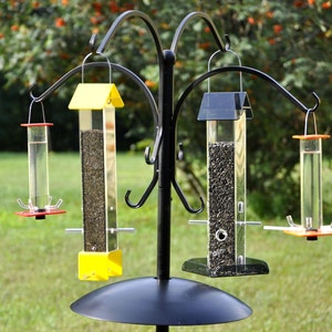 Four Feeder Package: A complete set designed to attract the widest variety of seed eating and nectar drinking birds to your yard!