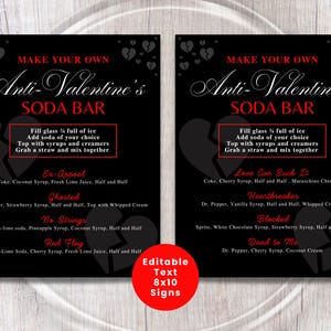 May include: Two black 8x10 signs with red and white text for an Anti-Valentine's Soda Bar. Each sign features a broken heart graphic and drink recipes like "Ex-Appeal" and "Love Can Suck It".
