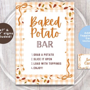 May include: A sign for a baked potato bar with the words "Baked Potato BAR" in orange script. The sign includes instructions: Grab a potato, slice it open, load with toppings, and enjoy. Includes add-on topping food cards.