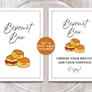 May include: Two white signs with black text that reads "Biscuit Bar" and "Choose your biscuit, add your toppings, enjoy!" with illustrations of biscuits. A circular sticker says "5x7" & 8x10" signs included!"