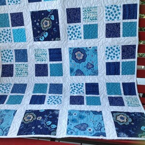 Navy and Turquoise flowered crib quilt