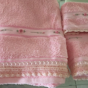 Pink deluxe  Embroidered bath towel, face washer, and hand towel set with hand crocheted edge.