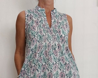 sleeveless tunic-dress,pink-green scrolls pattern