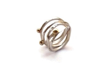 Silver wire ring with bronze dots