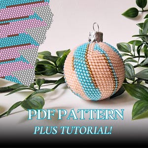 May include: A beaded Christmas ornament with a pattern of pink, blue, and gold beads. The ornament is round and has a silver cap. The image also includes a pattern diagram and the text "PDF PATTERN PLUS TUTORIAL!"