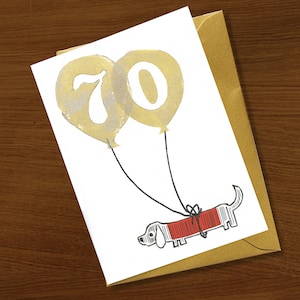Carte du 70e anniversaire, carte d'anniversaire des 70 ans, célébration de l'âge spécial, encre dorée, soixante-dix ans, anniversaire marquant, chien chat amoureux des animaux