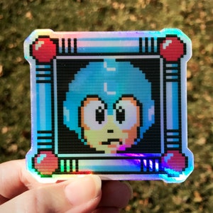 Holographischer Mega Man Aufkleber (KOSTENLOSER VERSAND), Kreuzstich Aufkleber, 1980er Jahre Cartoon, Mega Man 3 Aufkleber, Laptop Aufkleber, Gen X Geschenk