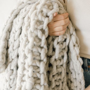 Chunky Knit Blanket made with hand spun natural wool, chunky throw in natural grey color as seen in Apartment Therapy, living room decor image 2