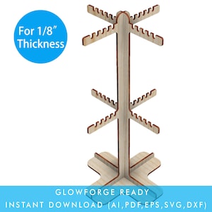 May include: A wooden stand with six arms for holding items, designed for 1/8 inch thick material. The stand is made of light brown wood and has a square base. The text "GLOWFORGE READY" and "INSTANT DOWNLOAD (AI, PDF, EPS, SVG, DXF)" is printed on the base.