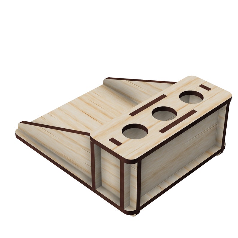 May include: Wooden organizer with four round holes and a slanted shelf. The organizer is made of light wood with dark brown trim.