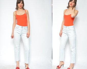 Jeansy Levi's Acid Wash Boyfriend w stylu vintage: jasnoniebieski denim z lat 90., rozmiar M