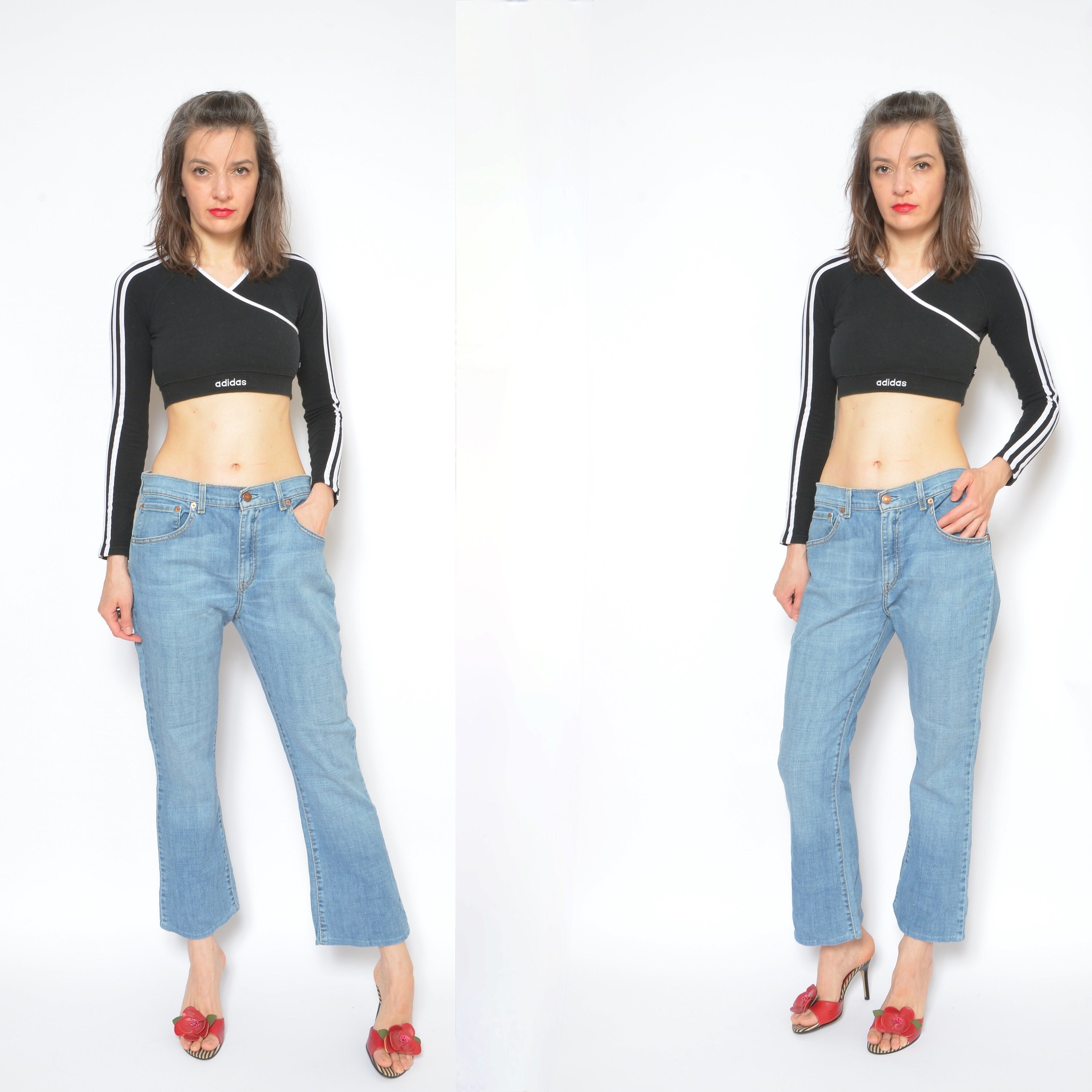 May include: A woman wearing a black long-sleeved crop top with white stripes and the word "adidas" on the front. She is also wearing blue denim jeans with a bootcut style and red heeled sandals.