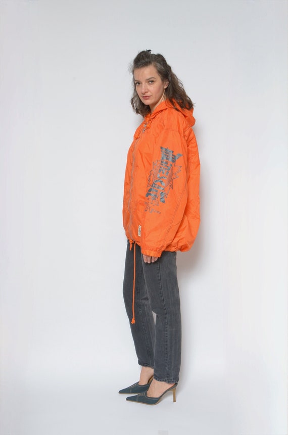 Jacket with orange zipper deals