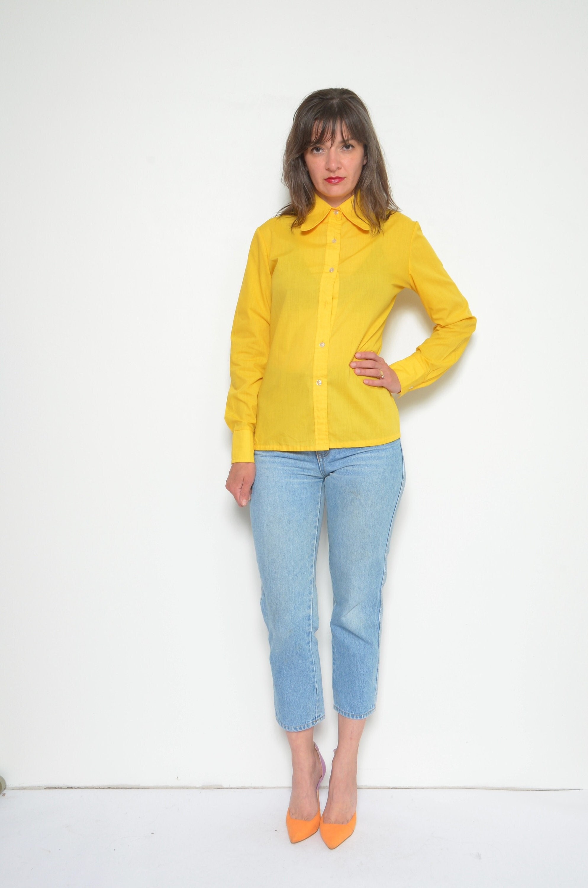 bright yellow button down shirt