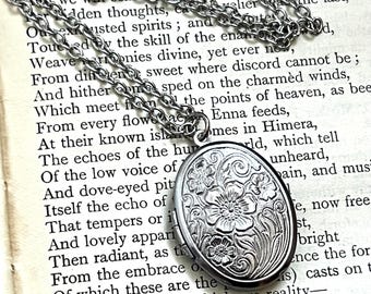 Silver tone locket necklace, oval stainless steel in vintage style floral design