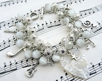 Music charm bracelet, plectrum guitar, music notes bracelet, white beads, silver charms, Rock & Roll Star