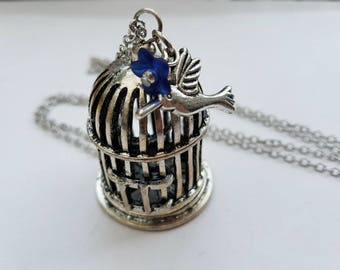 Large birdcage necklace with bird charm and blue flower, vintage inspired antique silver statement necklace