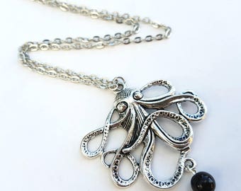 Octopus necklace, silver charm and black glass bead on antique silver chain