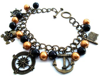 Pirate charm bracelet, skull and crossbones, comapss, anchor bronze charms and beads