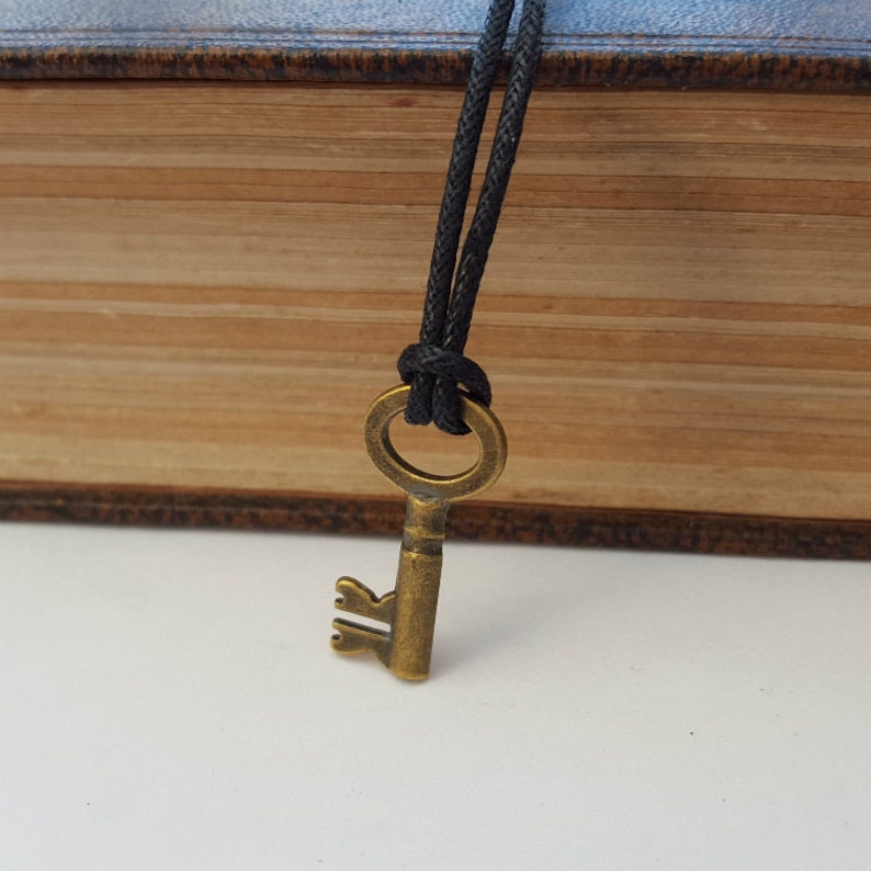 Key necklace bronze key charm on cord antique bronze vintage Etsy