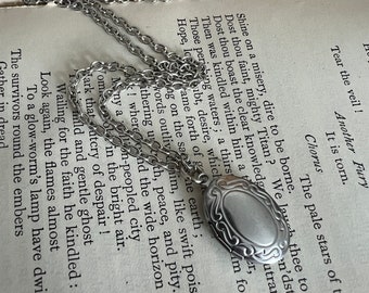Stainless steel small oval locket necklace on antique silver chain