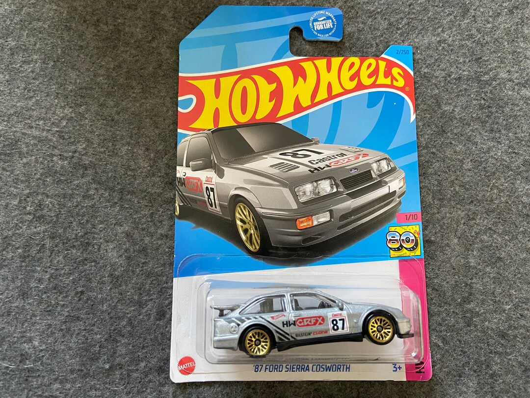 Hot Wheels - ´87 Ford Sierra Cosworth - Retro Racers 1/10 - HCT21 - Short Card - Bilstein - PIAA - Ryu's Rides - Mattel 2022