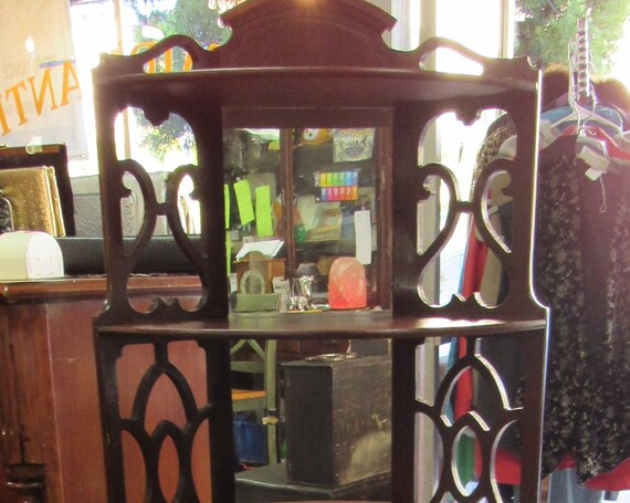 Mahogany corner curio shelf