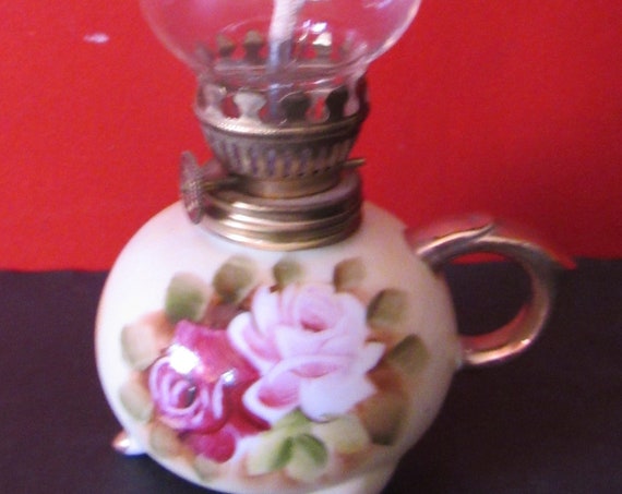 Miniature oil lamp by Norleans