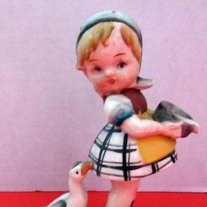 Occupied Japan girl figurine with duck