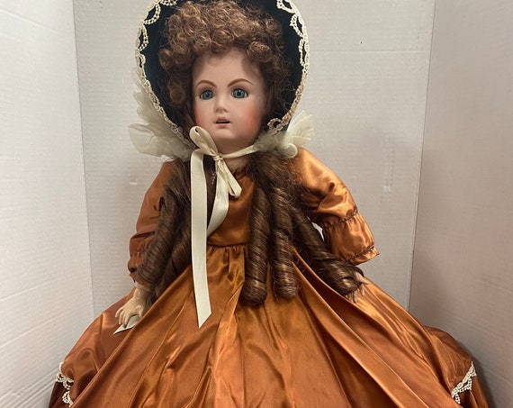 Antique bisque head doll