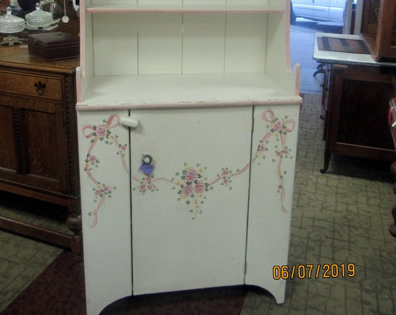 White and pink hutch cabinet