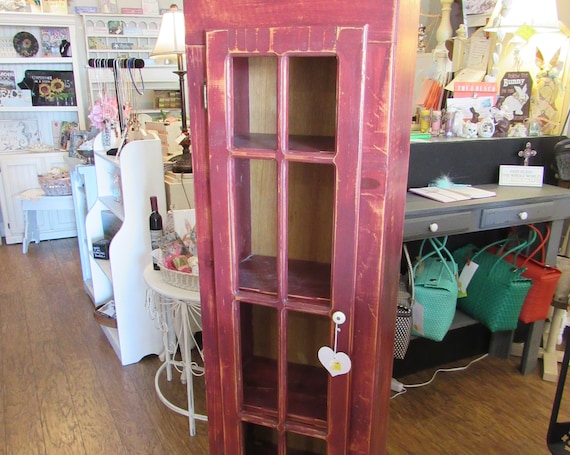 Red Cabinet with shelves and door
