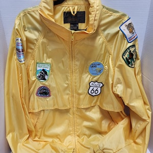 Eddie Bauer Wind Breaker jacket with souvenir patches