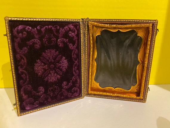 Antique folding picture frame