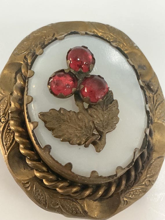 Antique brasss brooch with cherry