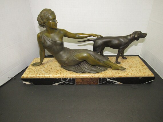 Diana and dog sculpture