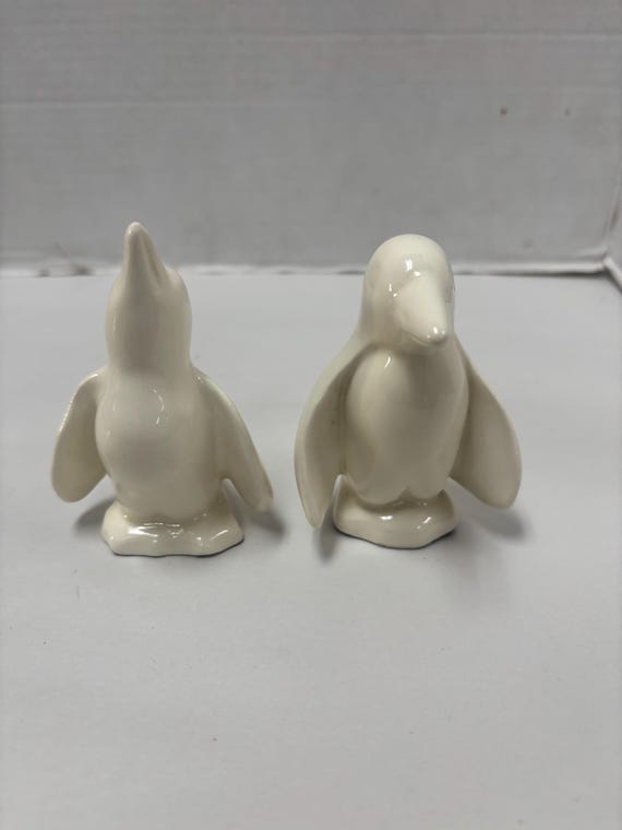 Pair ceramic penguins