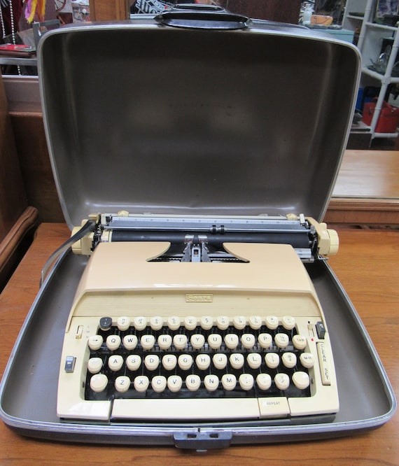 Portable typewriter by Sears