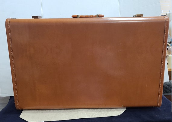 Leather Maximillian suitcase