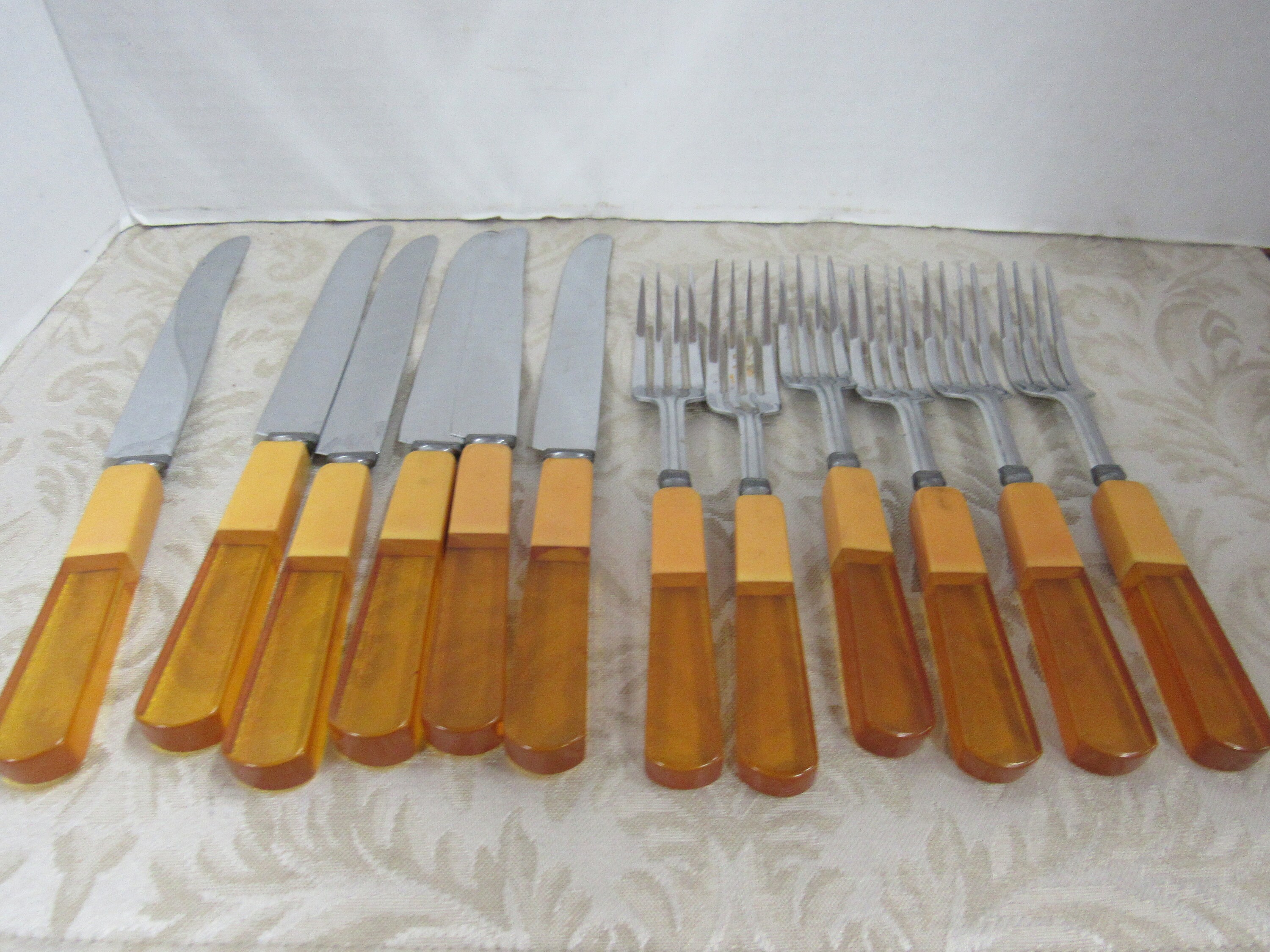 Butterscotch lucite flatware set