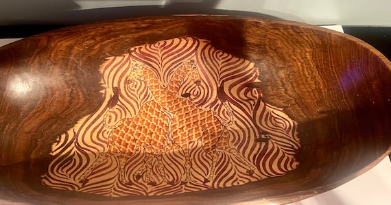Inlaid wood bowl with giraffe